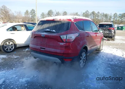 2017 Ford Escape Titanium z USA, uszkodzony, nr VIN 1FMCU0J98HUC98957